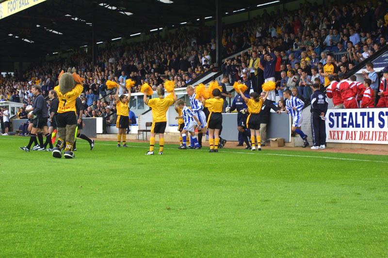 Taking too the pitch as Marvin Moose! looks on, Cambridge Game 11 August 2001