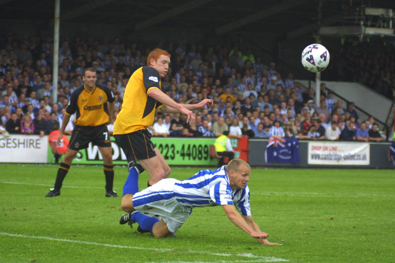 Simon Morgan heads the ball clear, Cambridge Game 11 August 2001