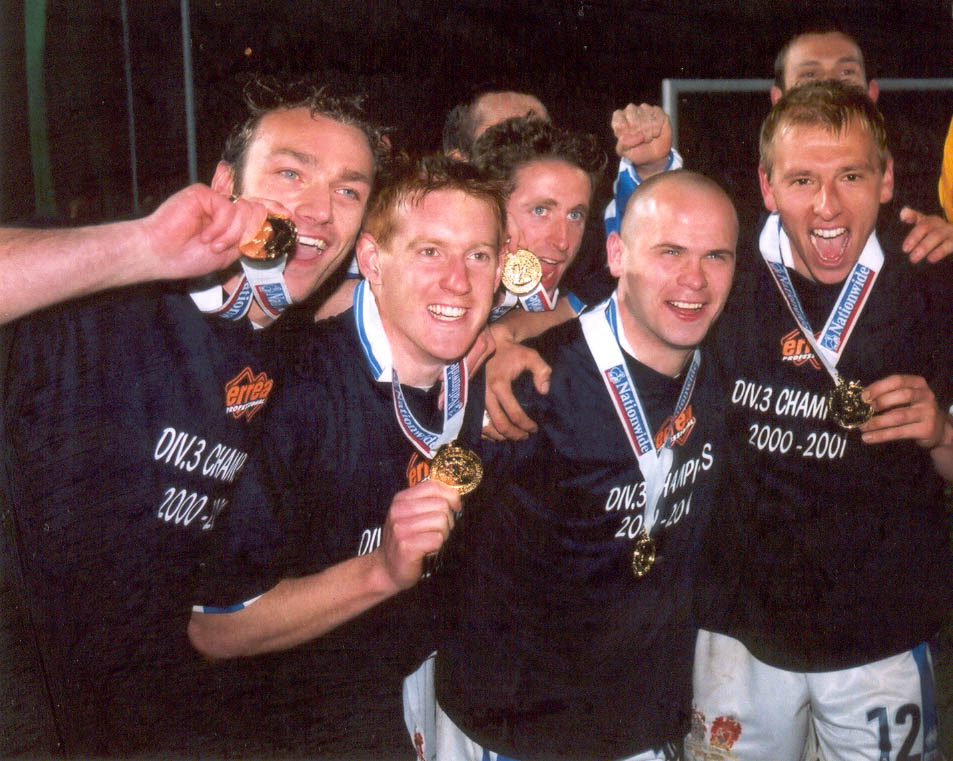 Freeman, Brooker, Cullip and ?? pose with medals Chesterfield game 01 may 2001