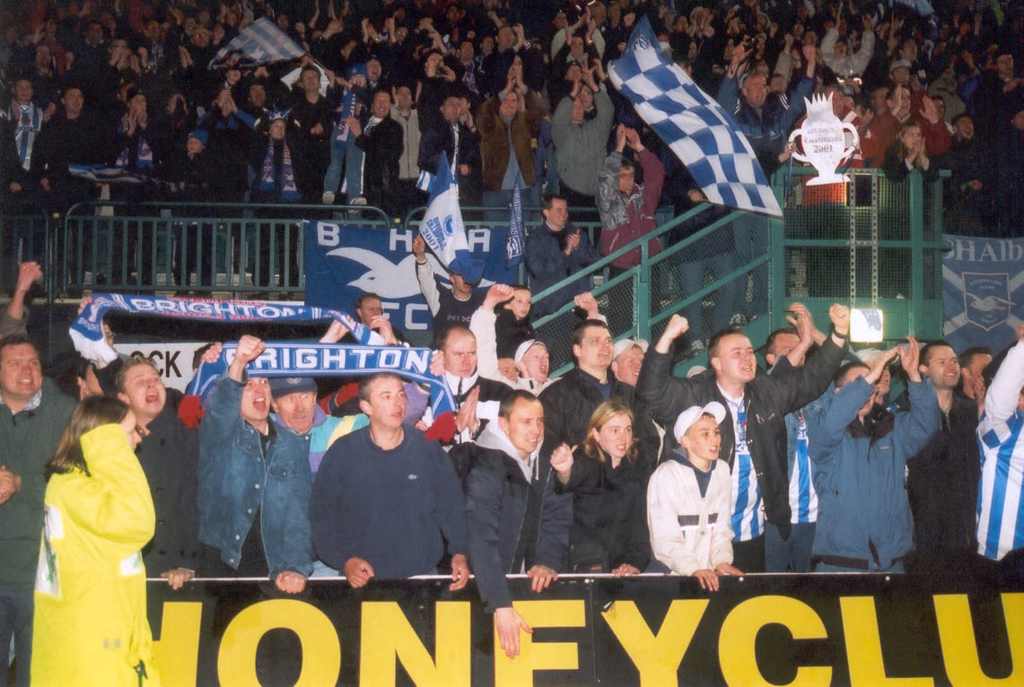 Crowd wait along the running track, Chesterfield game 01 may 2001