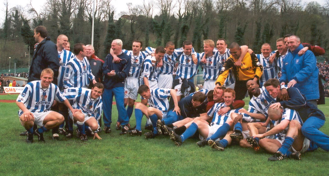 The team celebrate promotion, Darlington game 16 April 2001