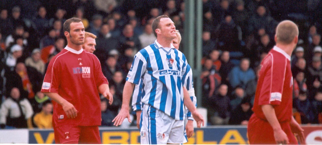 Crosby strains for the corner, Leyton Orient game 03 march 2001
