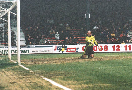 Orient Keeper point to where he thought the ball was, when in fact it is in the goal behind him, Leyton Orient game 03 march 2001