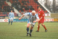 01011-21, Phill Stant lumbers forward, has someone told him he is 38 not 18 and that sort of hair do went out in the early 90's