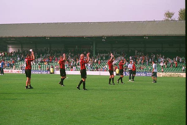 The team applaud the traveling support, Plymouth Argyle game 05 September 1999