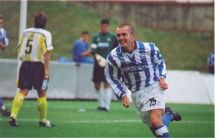 Nathan Jones wheels away after scoring, Torquay 02 September 2000