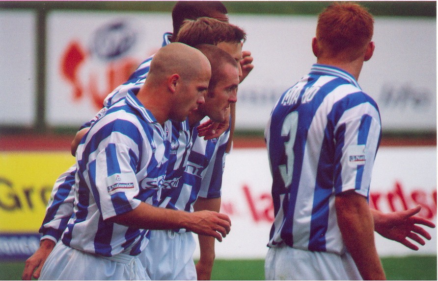 Nathan Jones celebrates after scoring, Torquay 02 September 2000